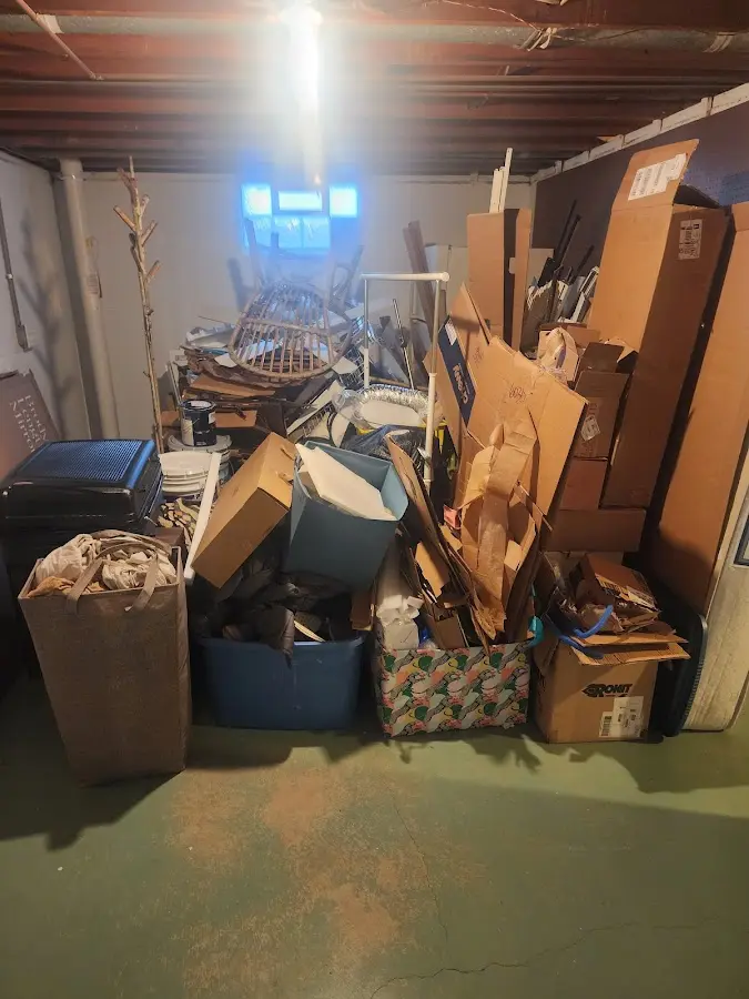 Roll-off dumpster container at job site for 4 Yard Dumpster Rental in Battlement Mesa